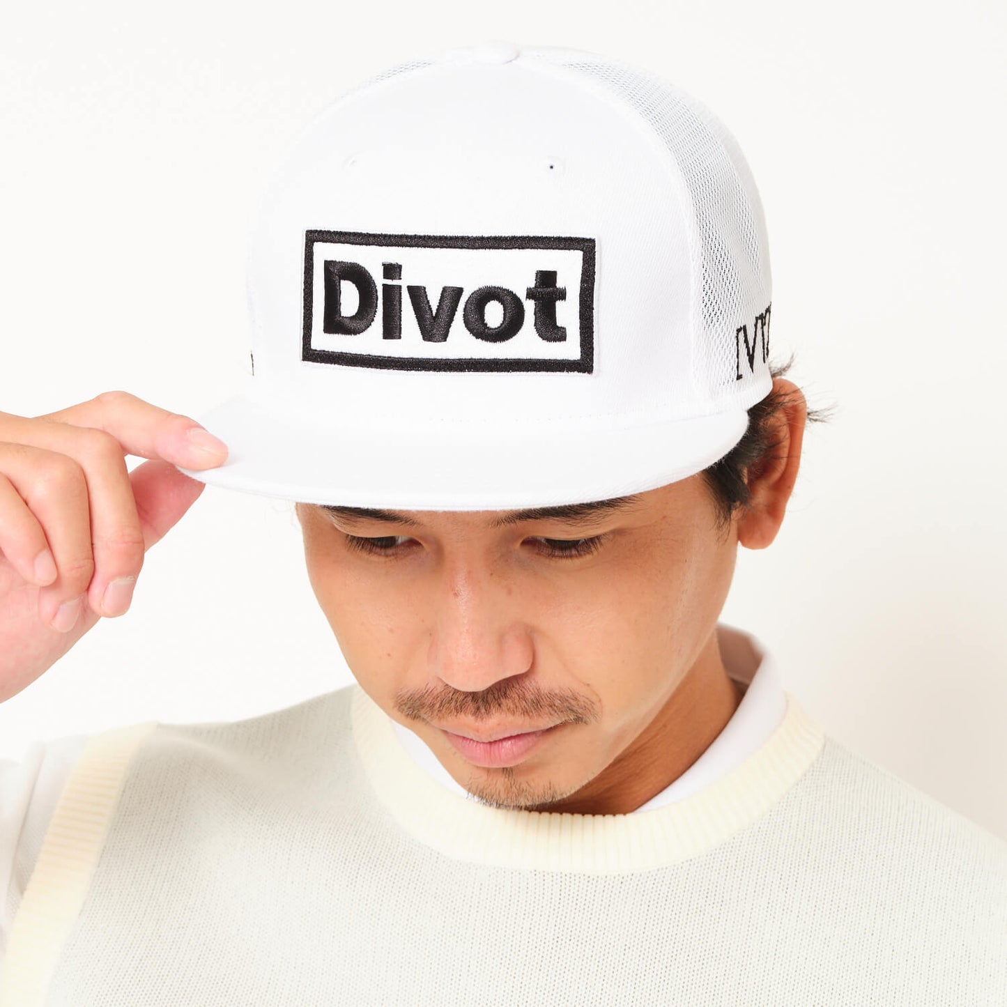 DIVOT CAP